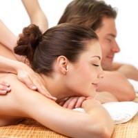Hands massaging beautiful women
